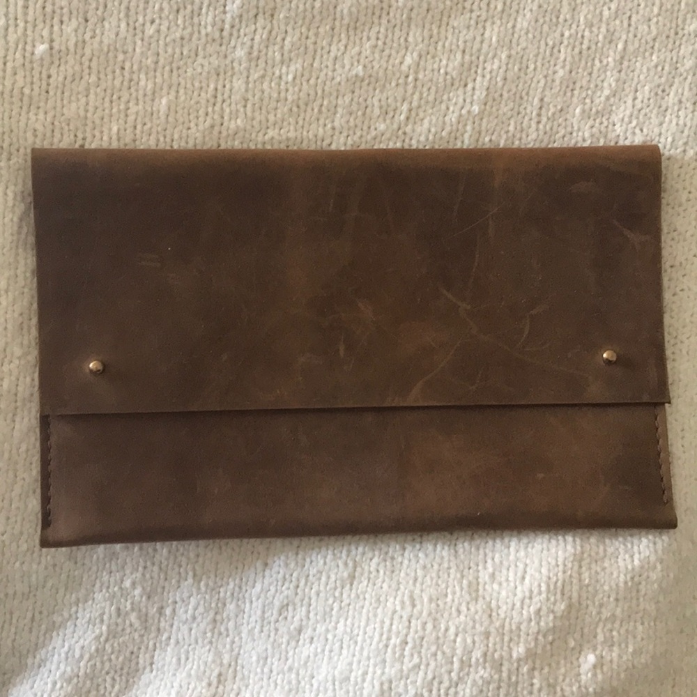 Roughman folded clutch